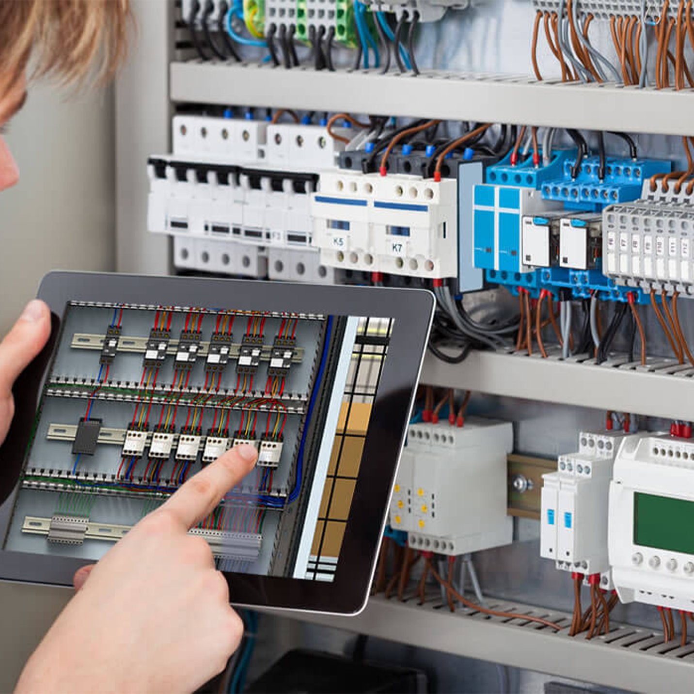 Technician handling circuit distribution panels
